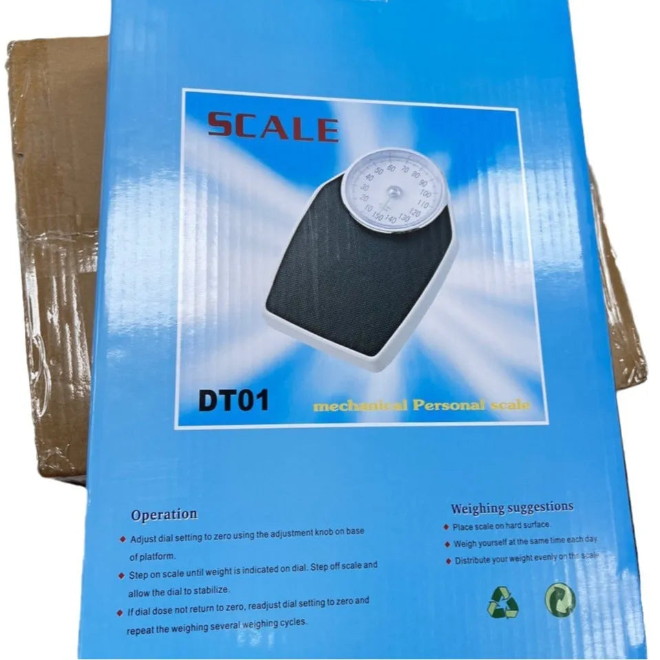 Black mechanical body weight scale with large dial measuring 47x35x11cm