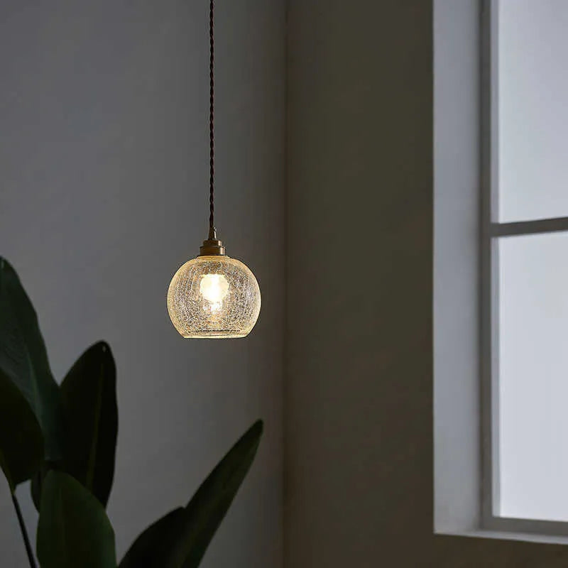 Compact brass-finished copper and glass ball chandelier ceiling light with three colour temperature options.