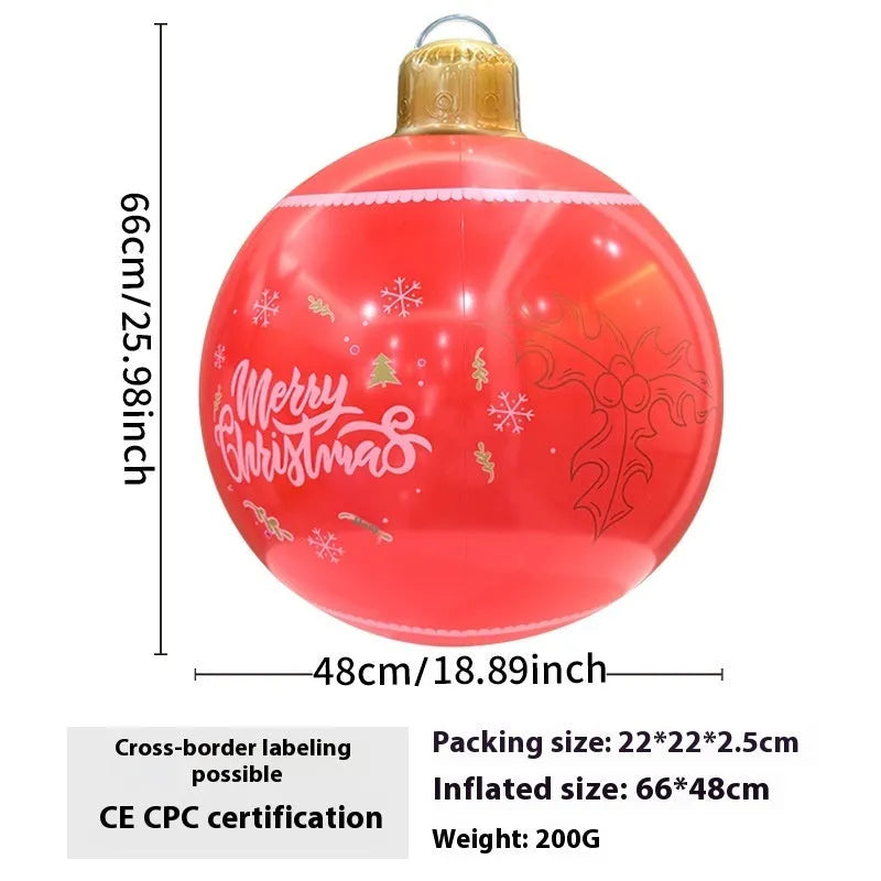 Large inflatable Christmas ball decoration with LED lights in garden setting
