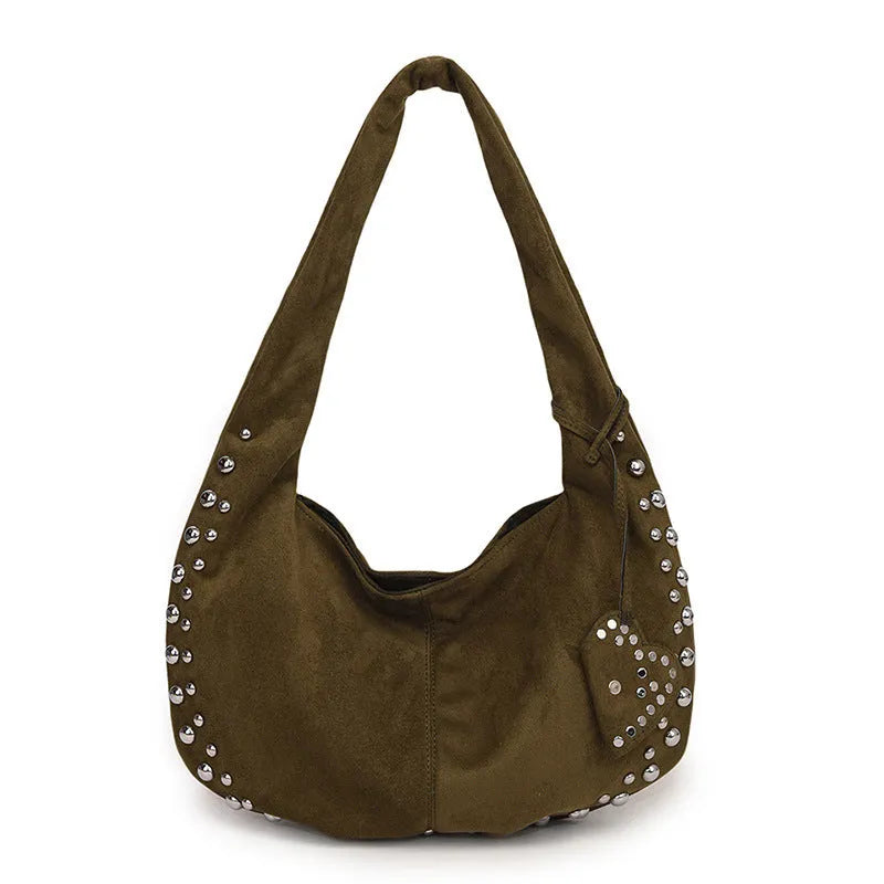 Soft plush women's tote handbag in retro style, carried underarm.