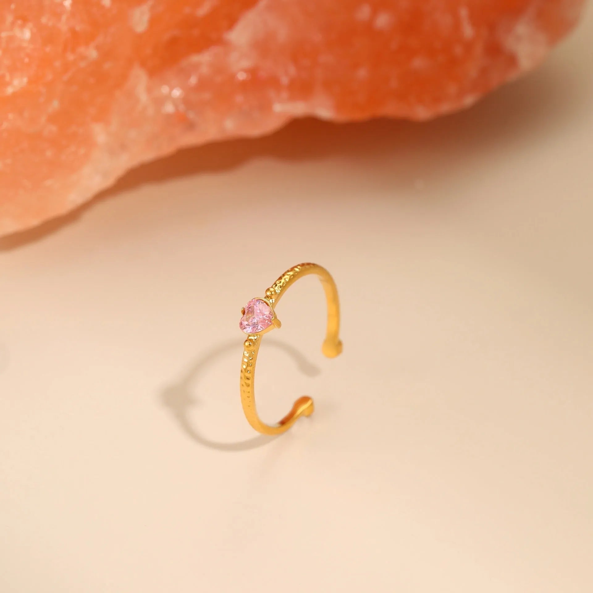 Open ended stainless steel ring with geometric setting and inlaid zircon love heart design in adjustable free size