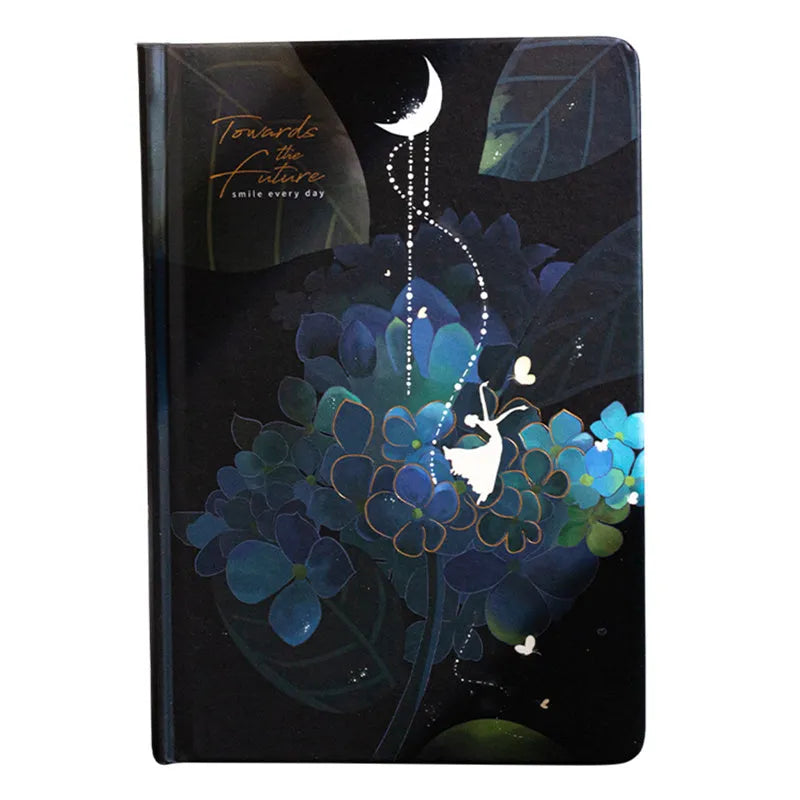 A5 spiral-bound notebook with a luminous holographic cover showing colour illustrations on the open pages.