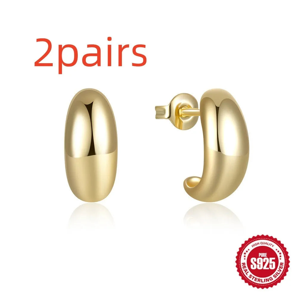C-shaped 925 sterling silver stud earrings with electroplated gold finish