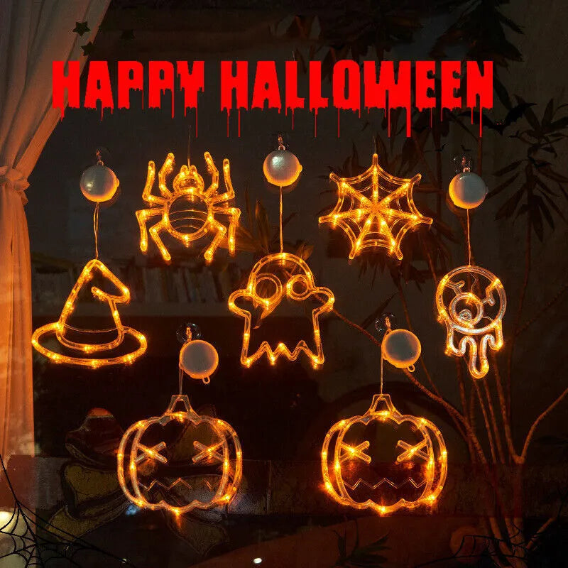 Set of seven battery-powered Halloween LED hanging lights with ghost, spider, and pumpkin designs for window decoration.