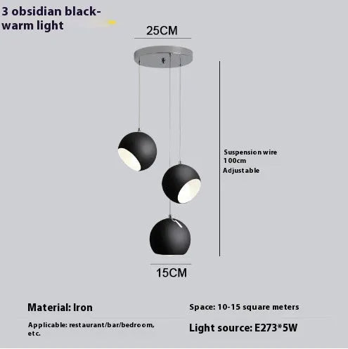 Modern Nordic-style ball chandelier table lamp in Moon White finish on a wooden surface.