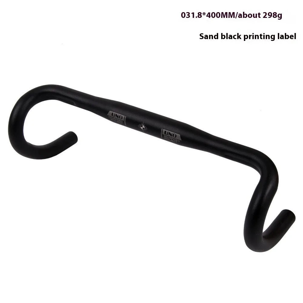 Black UNO aluminium alloy road bike drop handlebar showing bent shape and 31.8mm clamp area