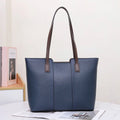 Women's genuine leather large capacity shoulder bag in khaki colour with visible sewing lines and a structured box shape.