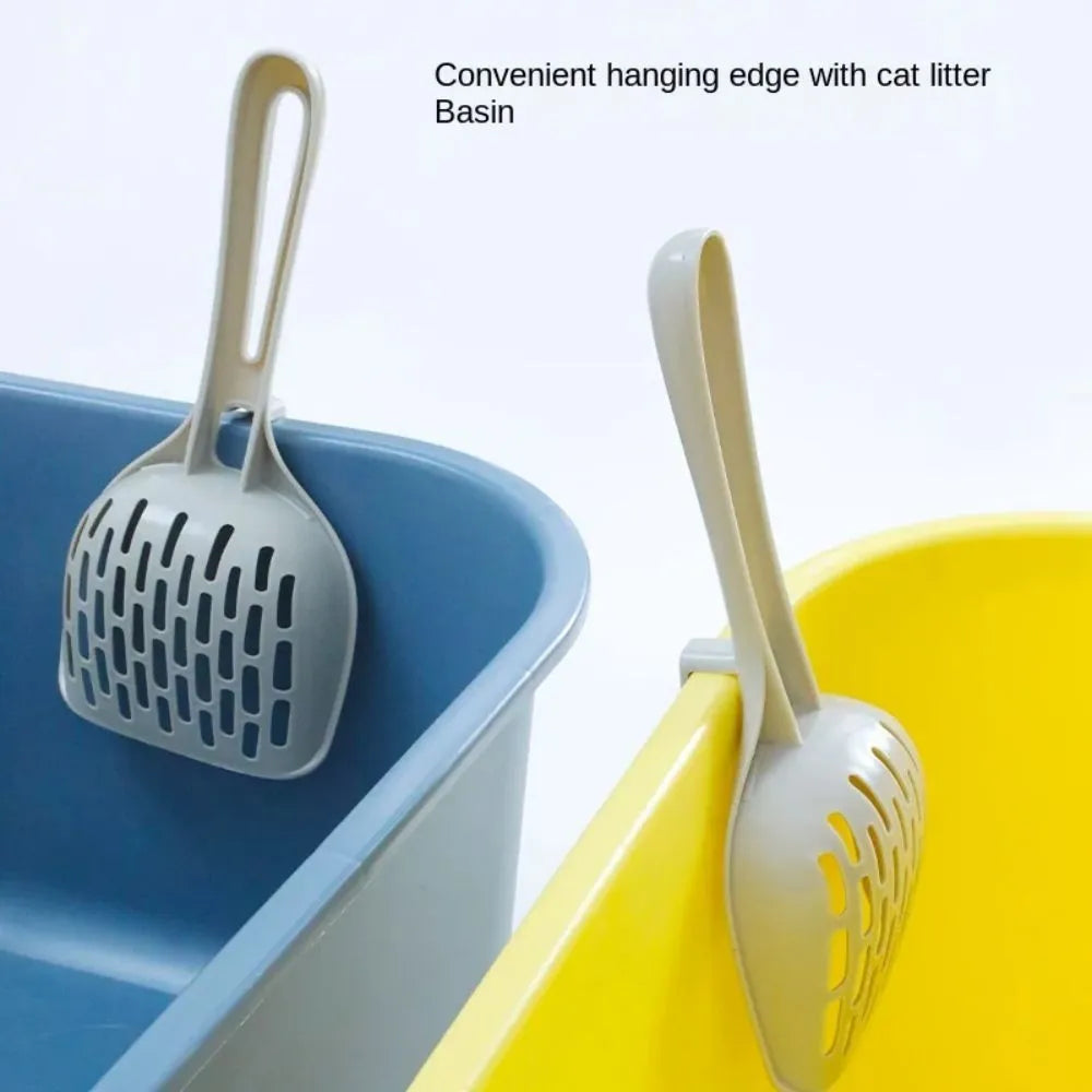Grey plastic cat litter scoop with storage base showing perforated strainer design