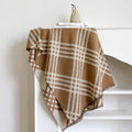 Long brown imitation cashmere scarf with tassels laid flat, showing its 185cm length.