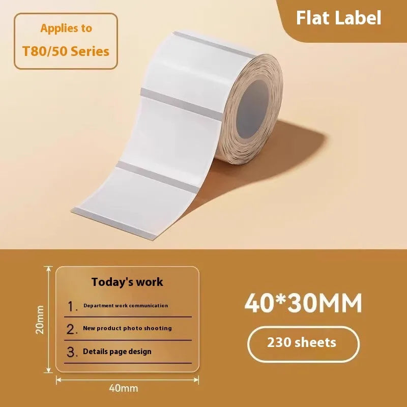 Roll of transparent waterproof adhesive labels showing rectangular and round sizes on thermal synthetic paper.
