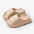 Women's beige thick-soled slippers with fish mouth pattern on 5.5cm EVA sole.