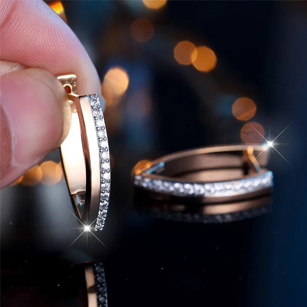 Geometric V-shaped women's clip-on earrings with champagne gold electroplating and white diamond accents