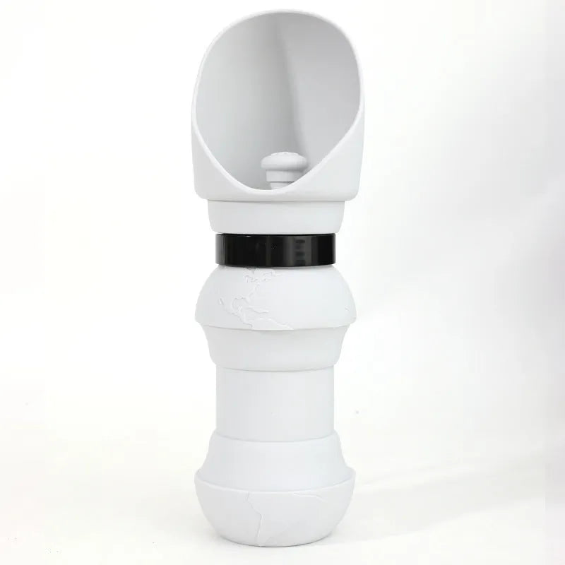 A folded and unfolded silicone water cup for pets, shown in green pineapple colour.