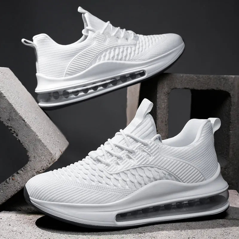 Men's black low-top mesh running sneakers with lace-up front and platform sole