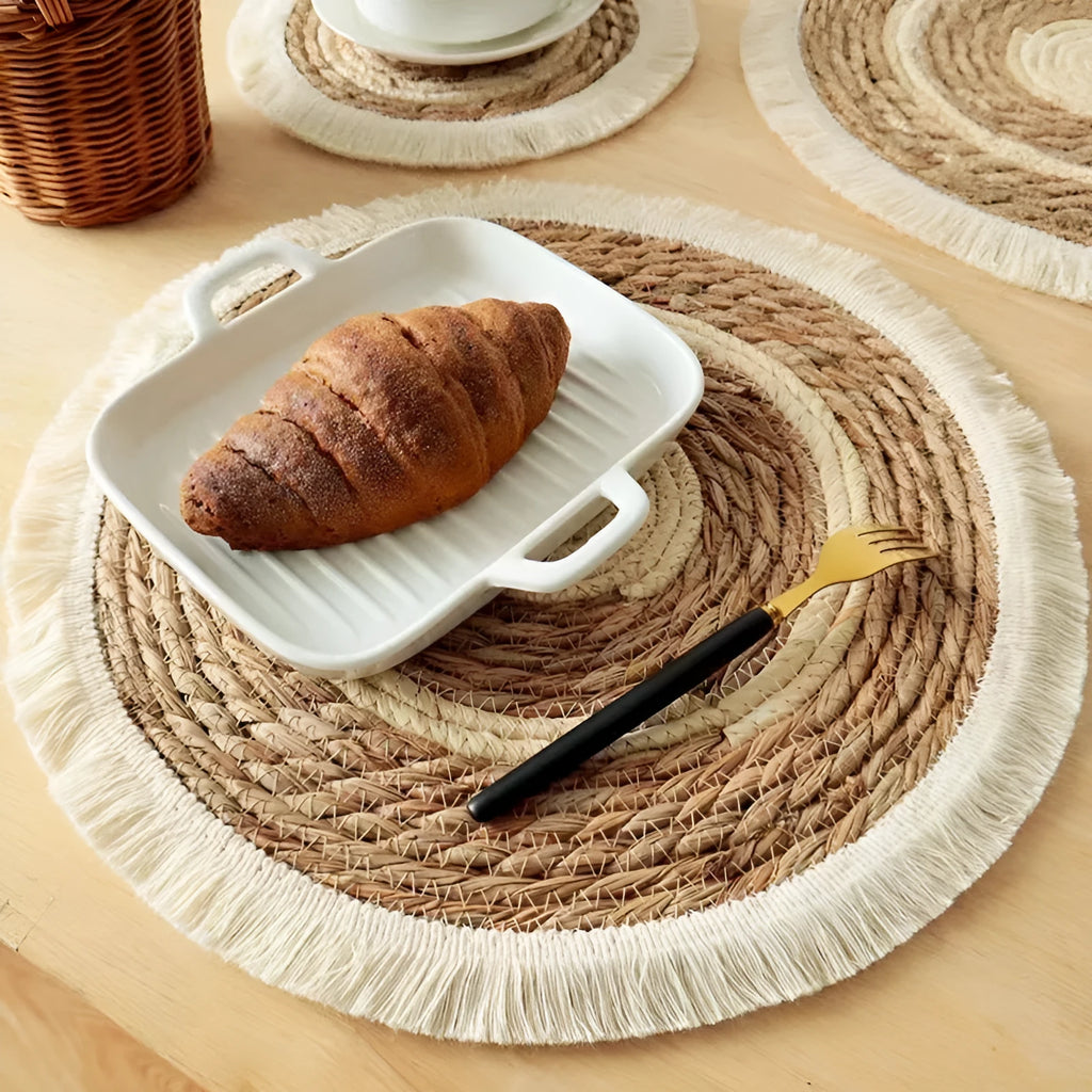 Round papyrus placemat with decorative tassels in Japanese straw design
