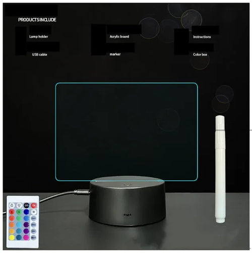 Black 3D acrylic message board night light on desk with remote control and stylus.