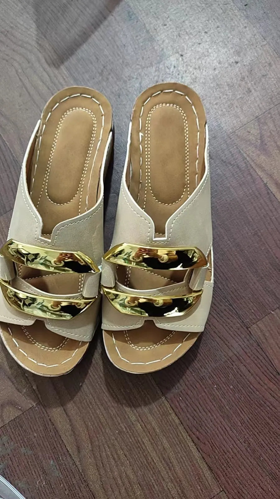 Roman style platform flip-flops in black, white, khaki, or sea blue with a rubber sole.
