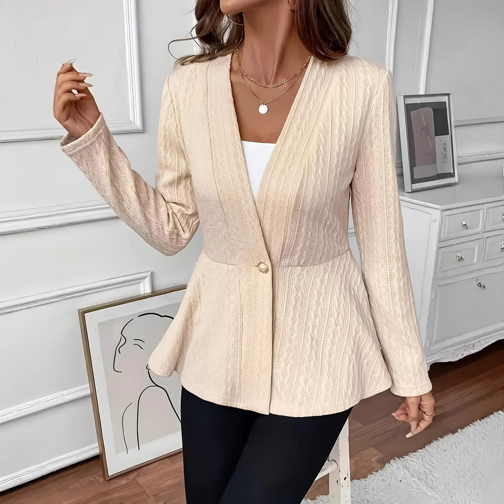 Women's apricot slim fit knitted cardigan with one button and jacquard pattern texture.
