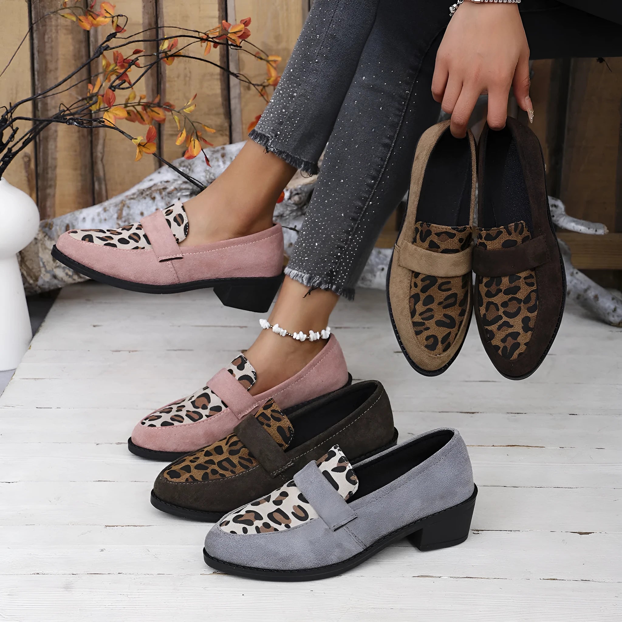 Leopard print slip-on suede shoes with chunky rubber sole and pointed toe design
