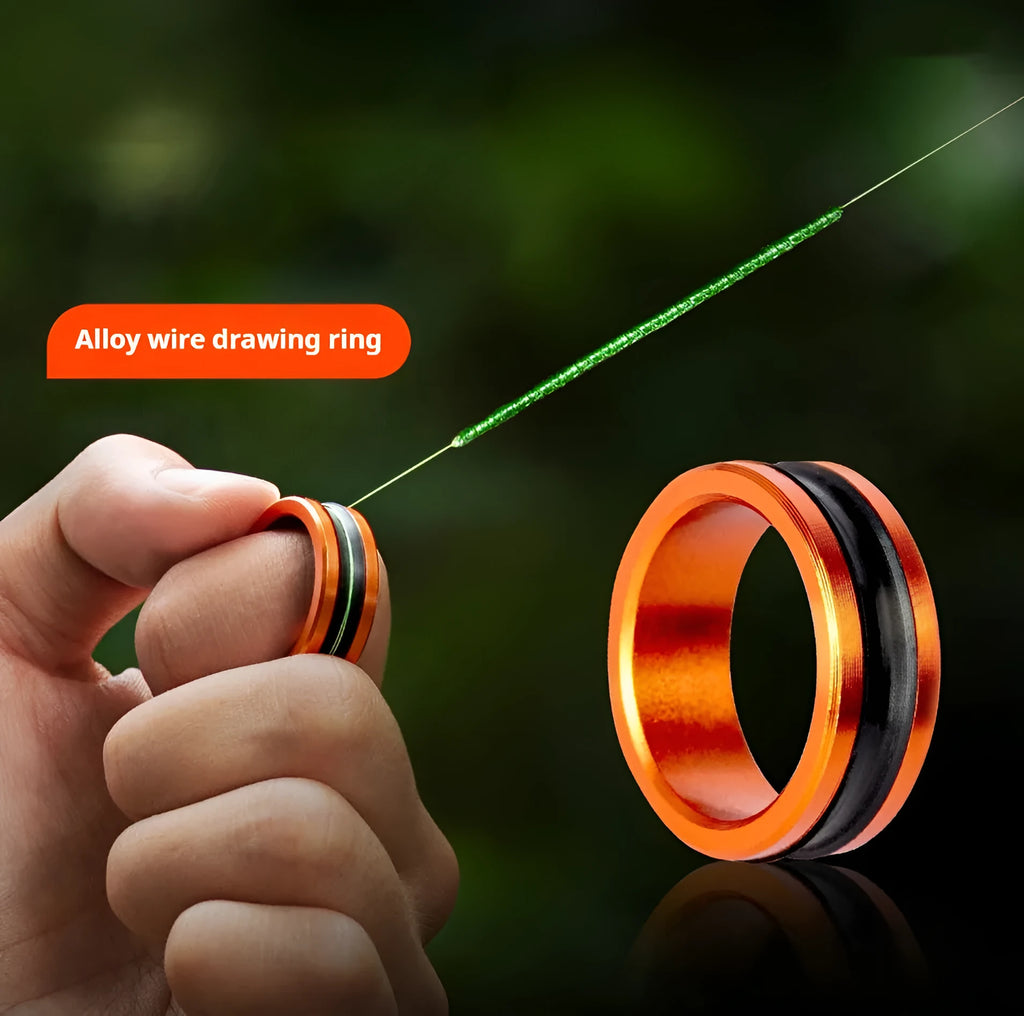 Orange and silver alloy fishing hand guard tool with non-slip grip and pull loop