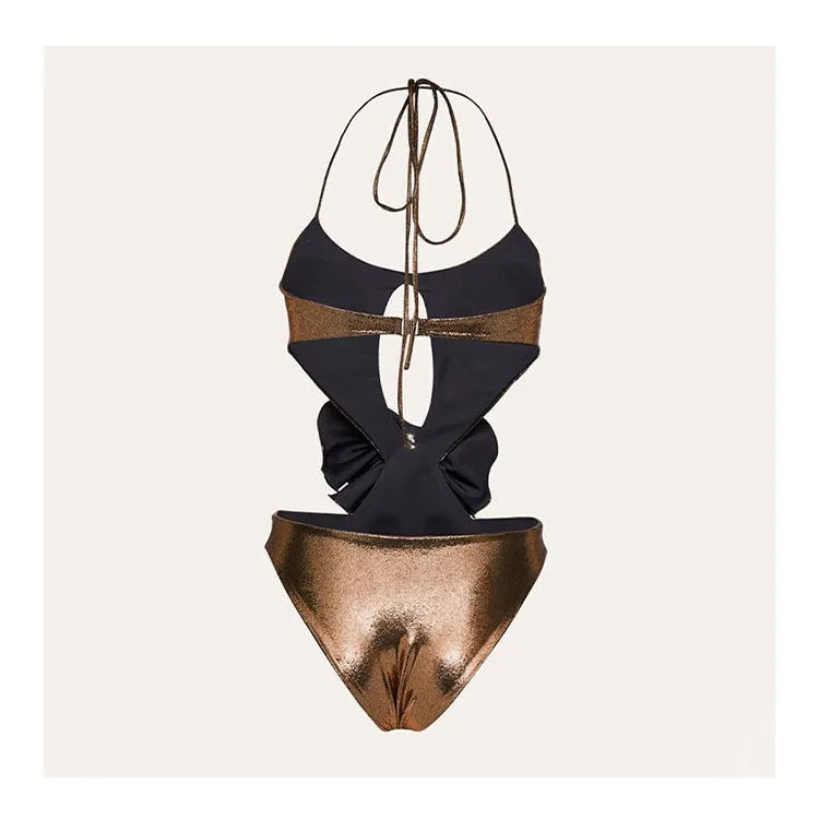 Gold coloured one-piece swimsuit with halter neckline on a model.