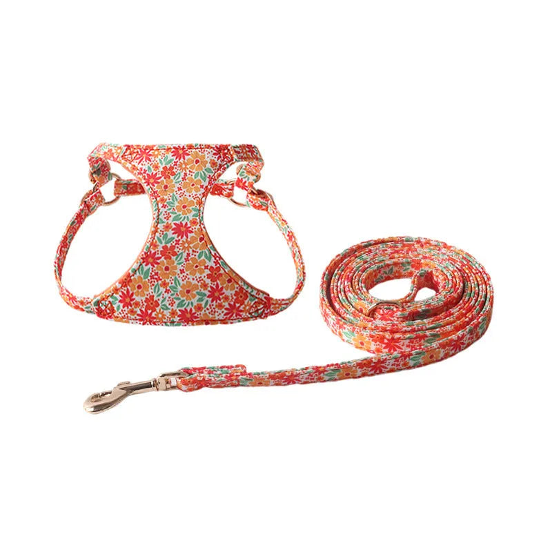 Floral pattern pet harness suit with matching leash in cloth material showing size options