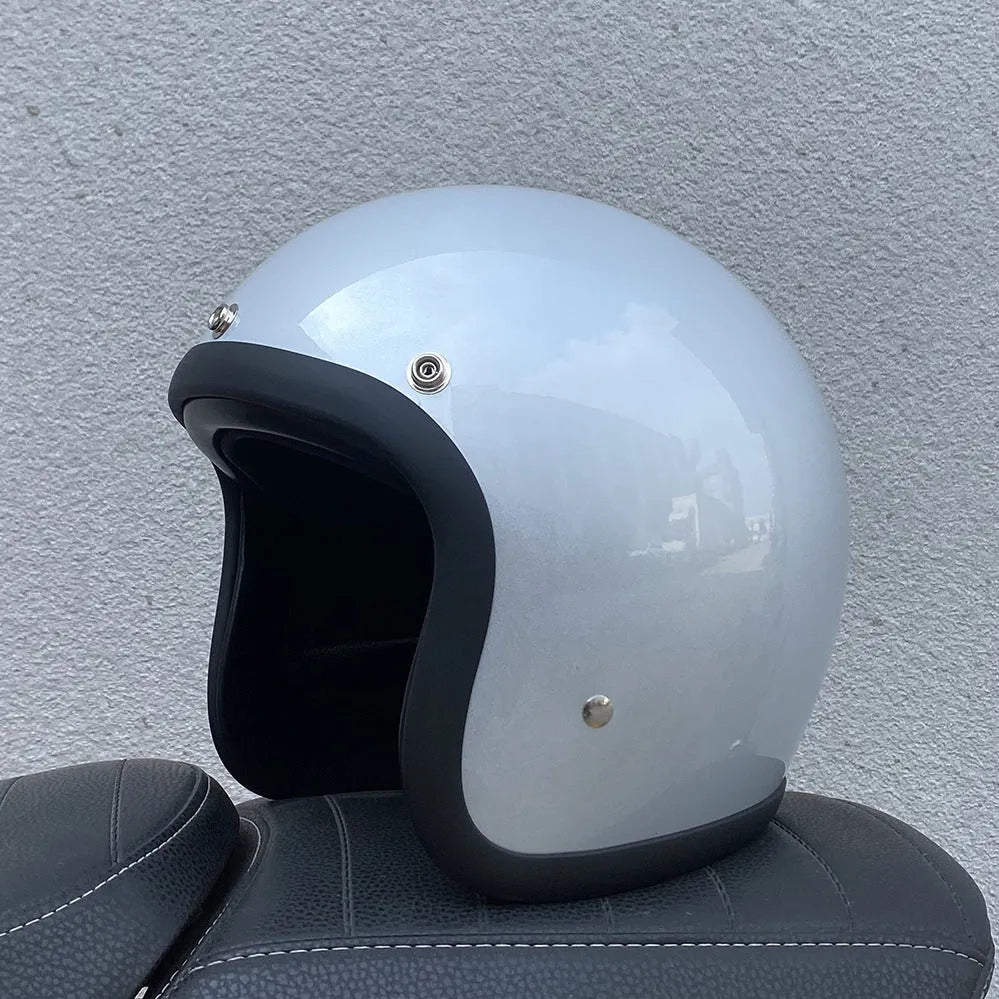 FRP retro-style half motorcycle helmet shown in a cement grey colour variant.