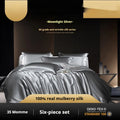 Silk four-piece quilt cover set in solid colour with fitted or flat sheet options for UK bed sizes.