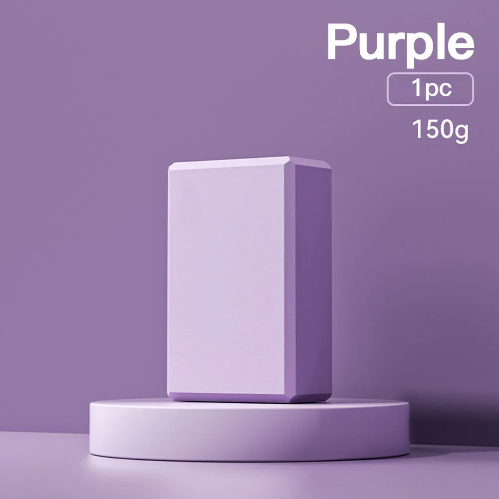 Solid colour EVA foam yoga block showing hexagonal facets and grip ridges