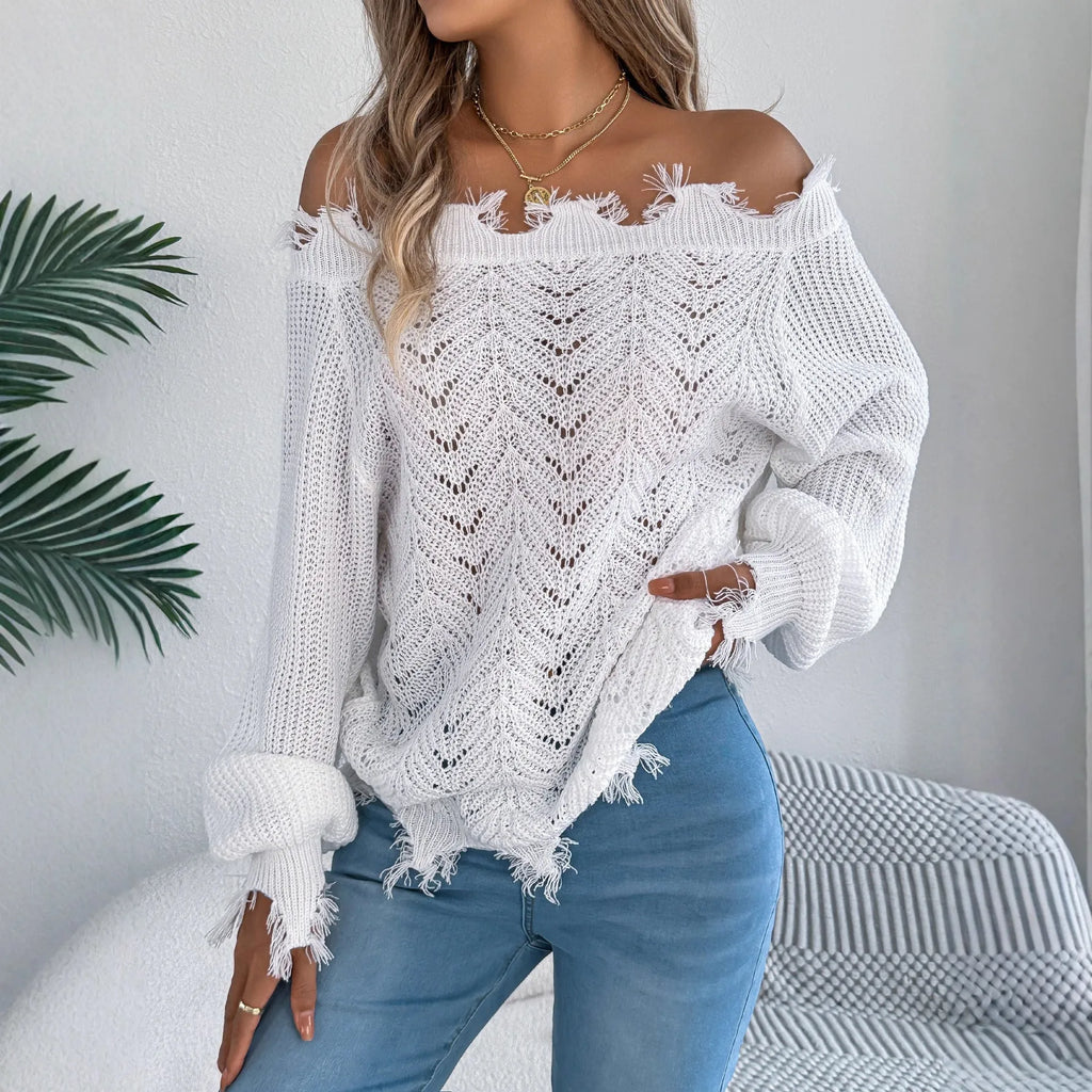 White hollow-out cut-off shoulder pullover sweater with long sleeves on hanger