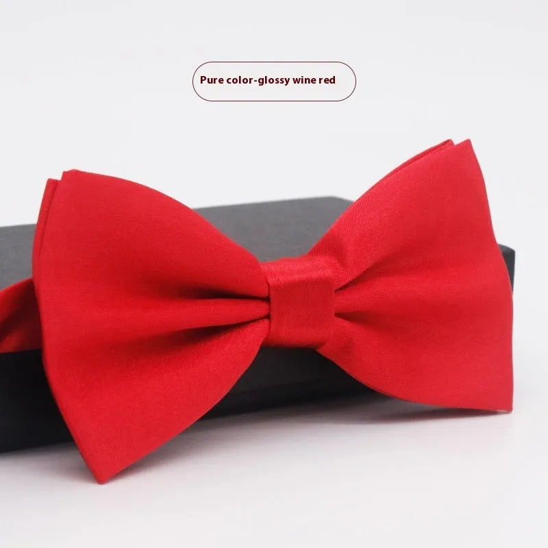 Men's flat head solid colour bow tie in polyester, showing 12cm by 6cm size on a background.