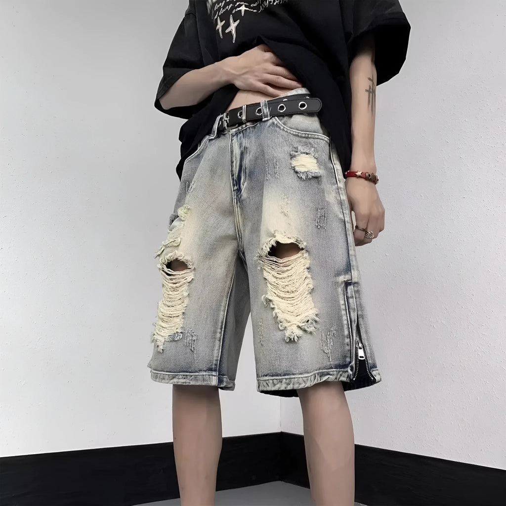 Blue wide-leg retro denim shorts on a neutral background