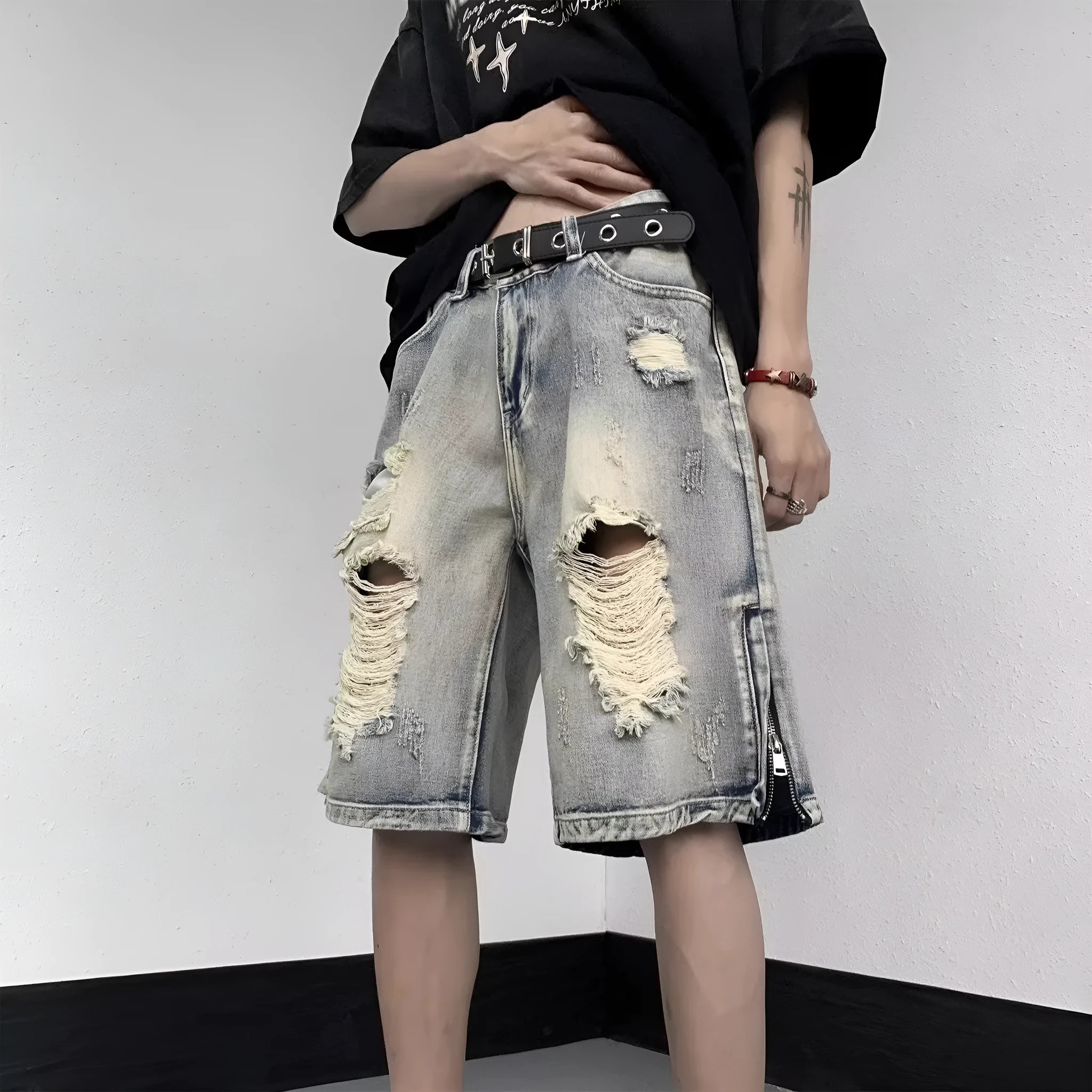 Blue wide-leg retro denim shorts on a neutral background