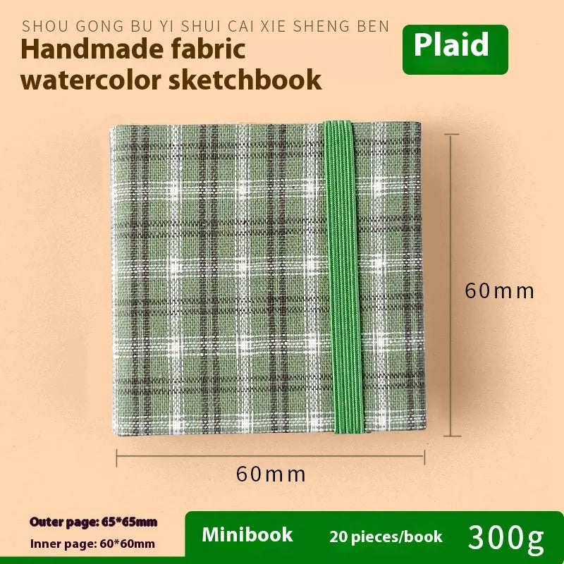 Feiluniao handmade fabric watercolour sketchbook with colourful themed cover, 185mm long.