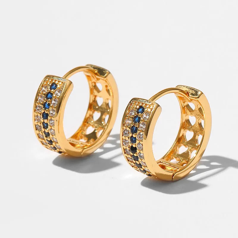 Women's geometric round earrings with gold plating on copper construction