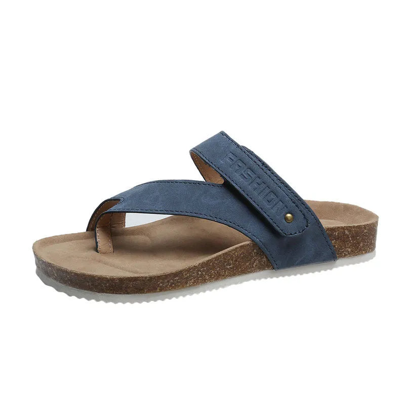 Flat toe ring thick-soled flip-flops in a solid colour on a foam sole.