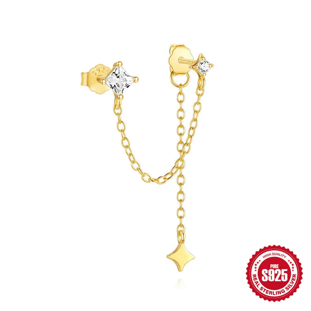 S925 sterling silver stud earrings with zircon inlay in golden geometric designs including clover and crown.