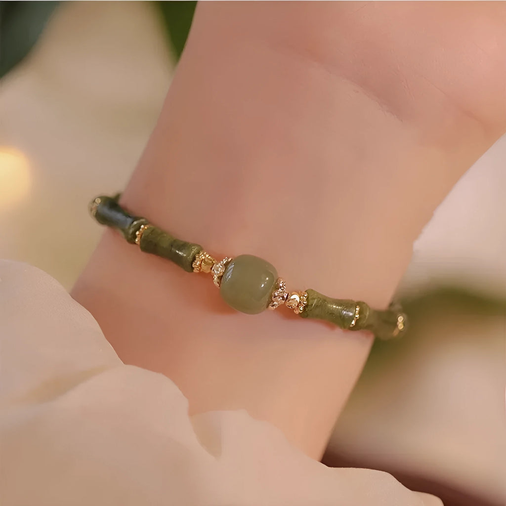 Simple geometric Hetian jade bracelet for women with round beads in dark green and light colour options.