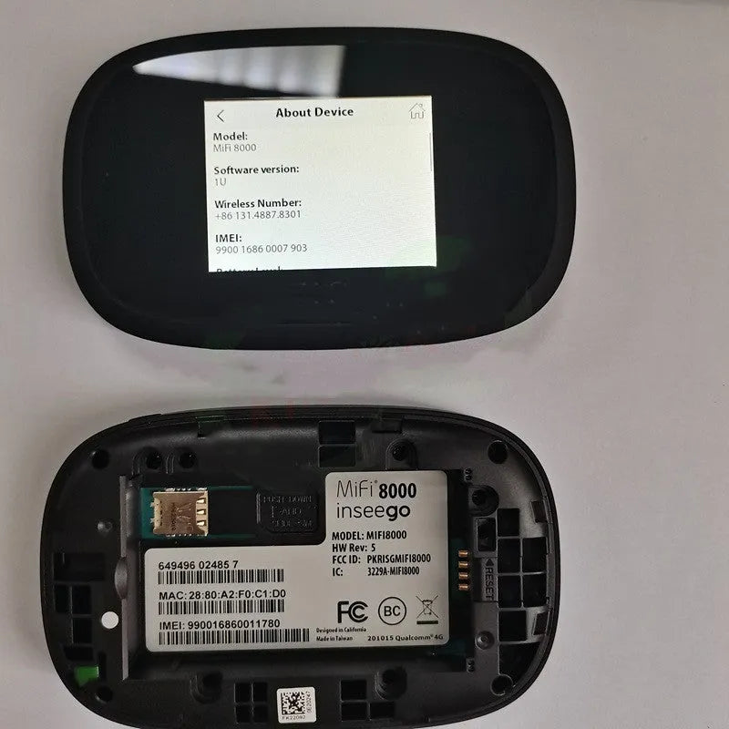 Black mifi8000 4G portable wireless router with battery and data cable on a white background.