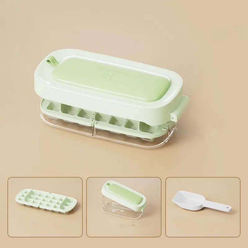 Yellow lever-operated ice cube tray grid with high capacity design and stored ice shovel.
