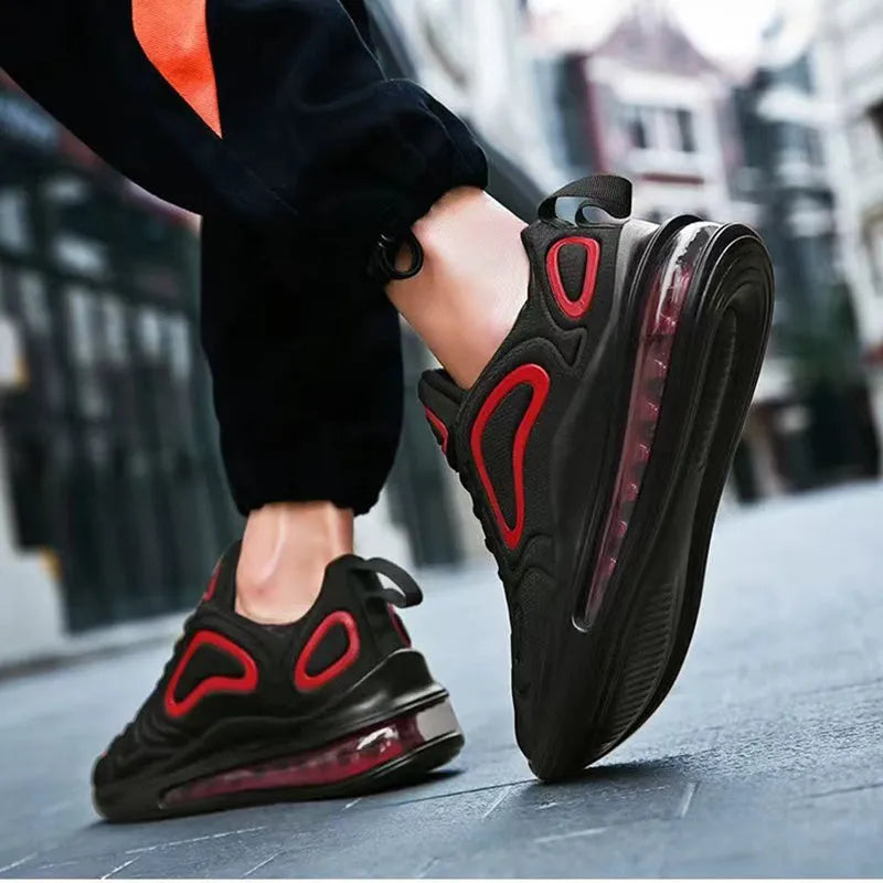 Men's black casual sneakers with lace-up front, thick sole, and round toe design