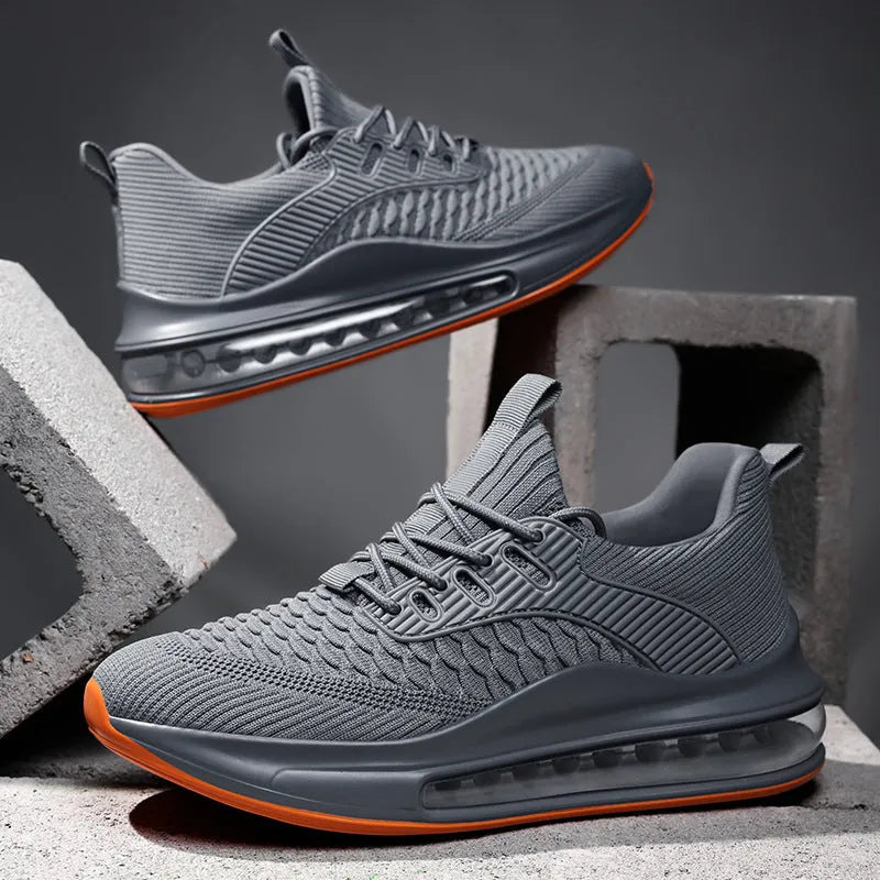 Men's black low-top mesh running sneakers with lace-up front and platform sole