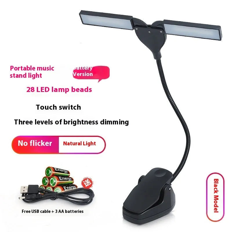 Black rechargeable music stand lamp with 28 LED lights and USB cable on a music stand.