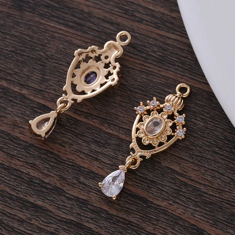 Small water drop-shaped pendant with micro inlaid zircon detail and crown hollow design