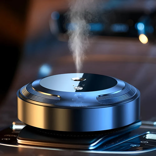 Car air freshener with vehicle logo design and USB charging cable on a car dashboard.