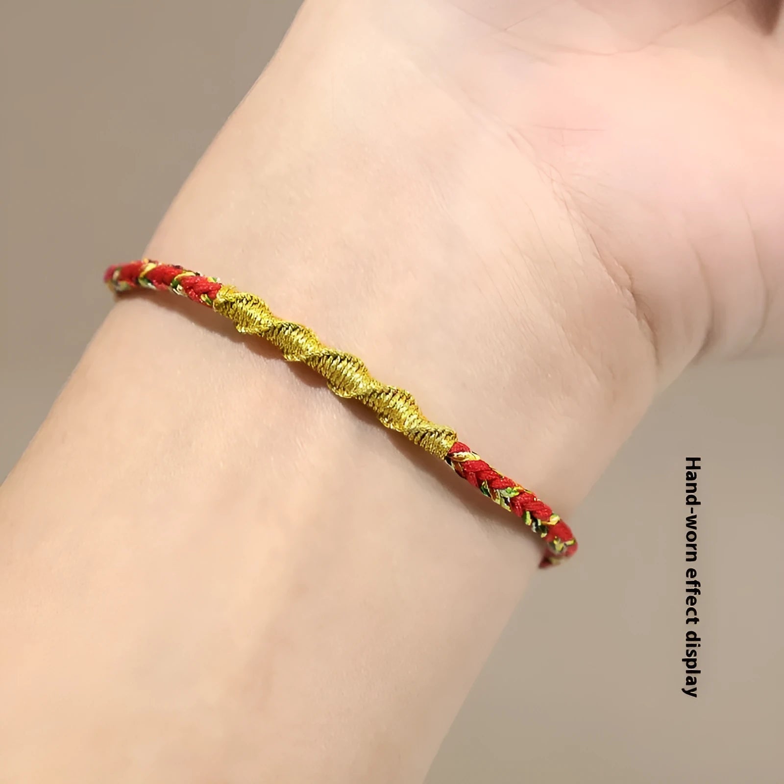 Adjustable eight-strand woven hand strap in zodiac colour theme with traditional pattern