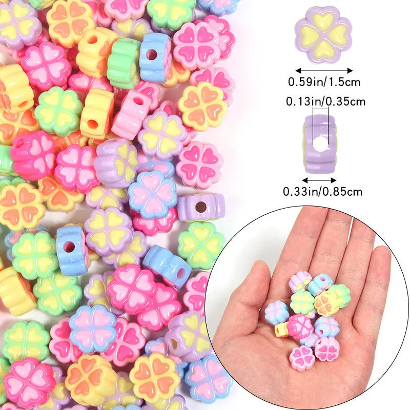 Acrylic four-leaf clover beads with frosted finish in mixed cartoon colours