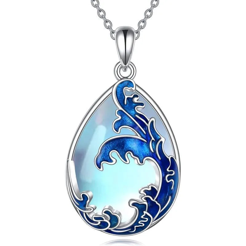 Blue heart-shaped pendant necklace with alloy chain on display