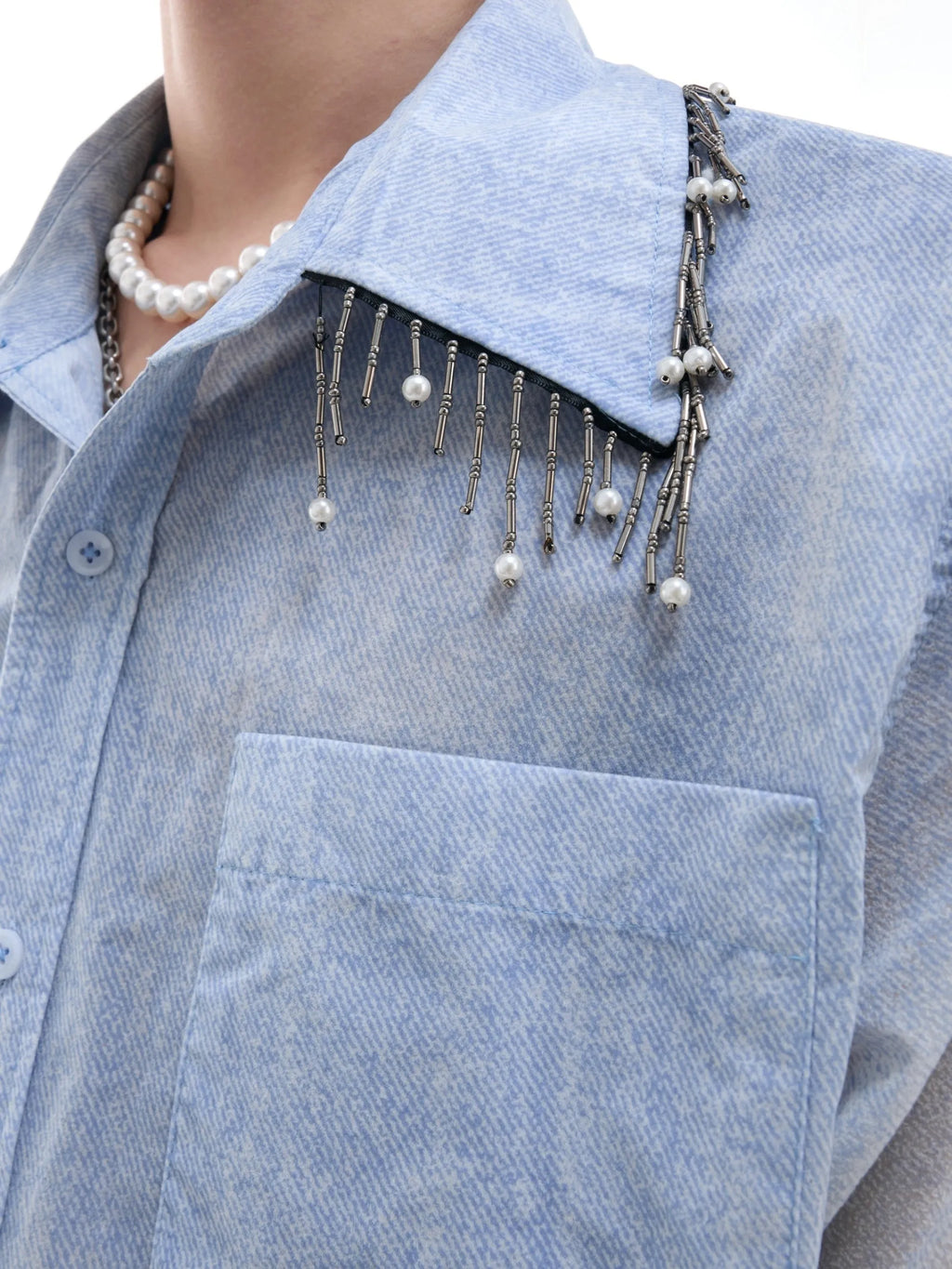 Men's solid blue loose fit short sleeve casual shirt on a hanger.