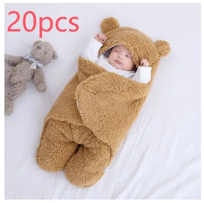 Baby quilted sleeping bag wrapper in cotton blend fabric showing six colour options and three size measurements